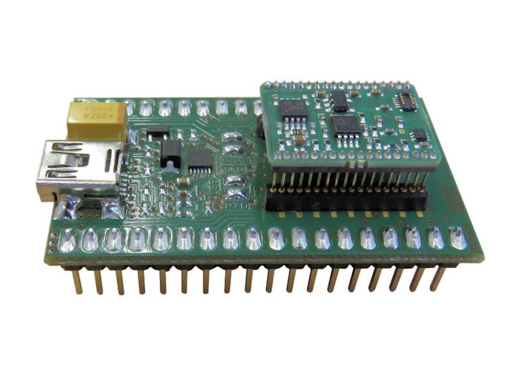 The Development Board serves to receive a GSV-6CPU module; The voltage supply and the communication is done via the USB port
